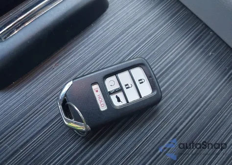 2019 Honda Pilot Touring z USA, uszkodzony, nr VIN 5FNYF5H91KB011966